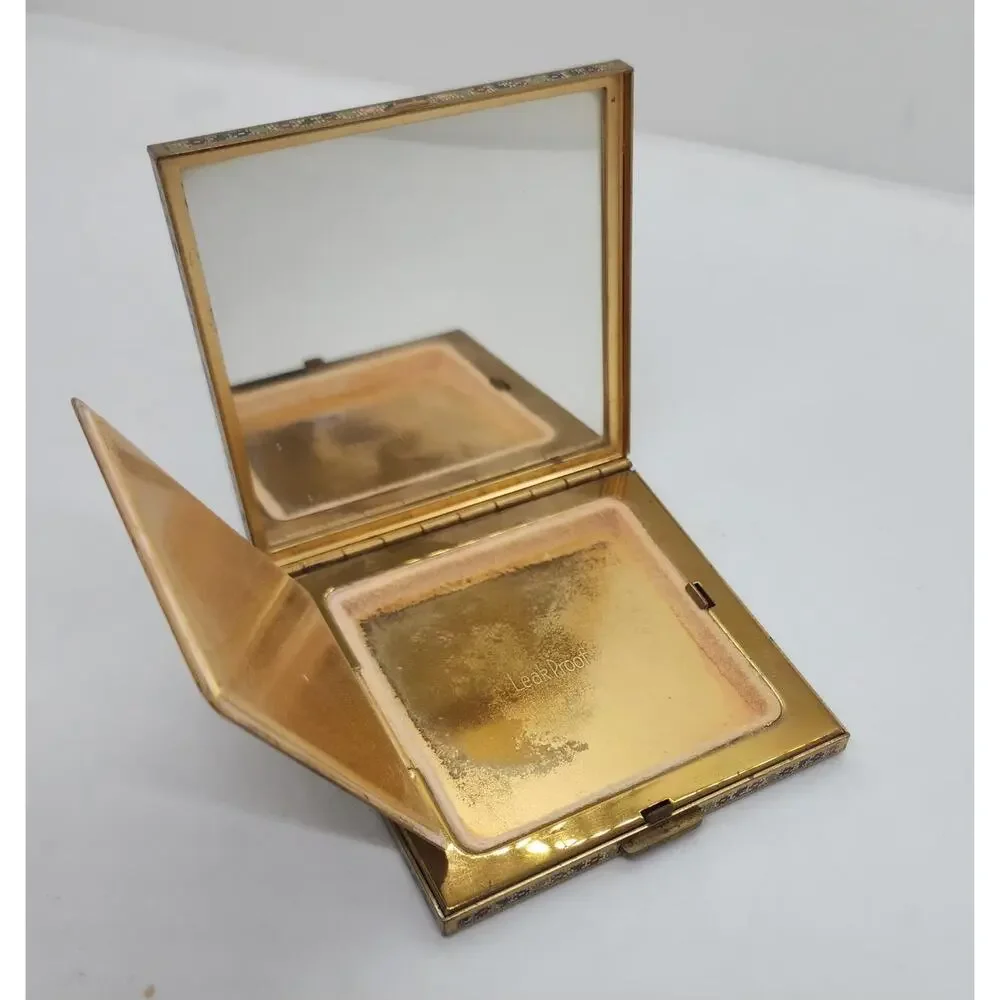 Vintage Volupte Leakproof Compact Needlepoint Look Floral Mirror Gold Tone USA